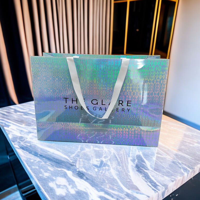 Tissu personnalisé Noir pour les petites entreprises Votre propre logo Imprimez un sac-cadeau en papier de marque Sacs de luxe avec logo